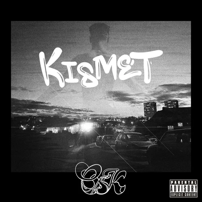Kismet cover: black and white night view over an estate, KISMET in white marker, OSK tag below.